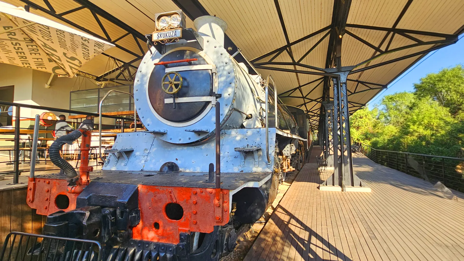 Kruger Shalati train carriages on the Selati Bridge, seen from the public Kruger Station Precinct at Skukuza
