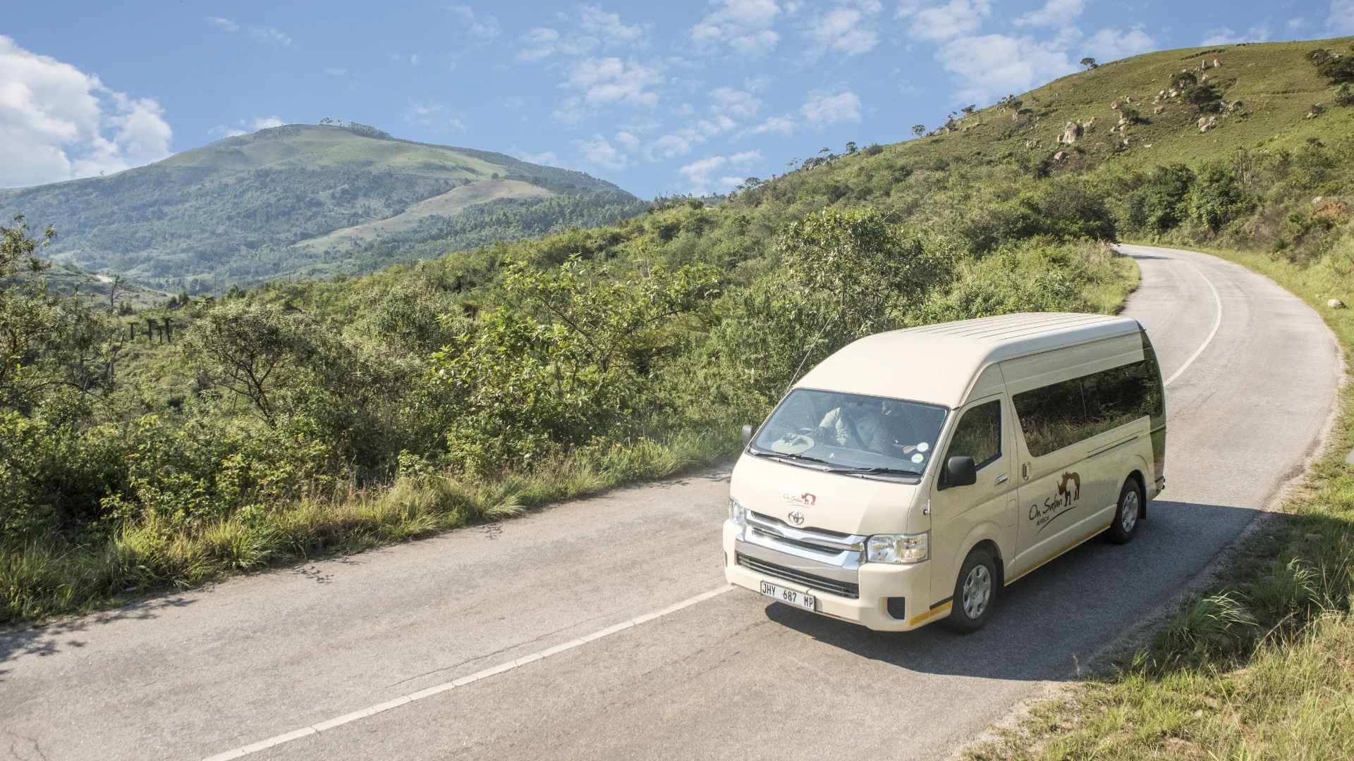 Private transfer vehicle on the scenic route toward Leopard Hills Lodge
